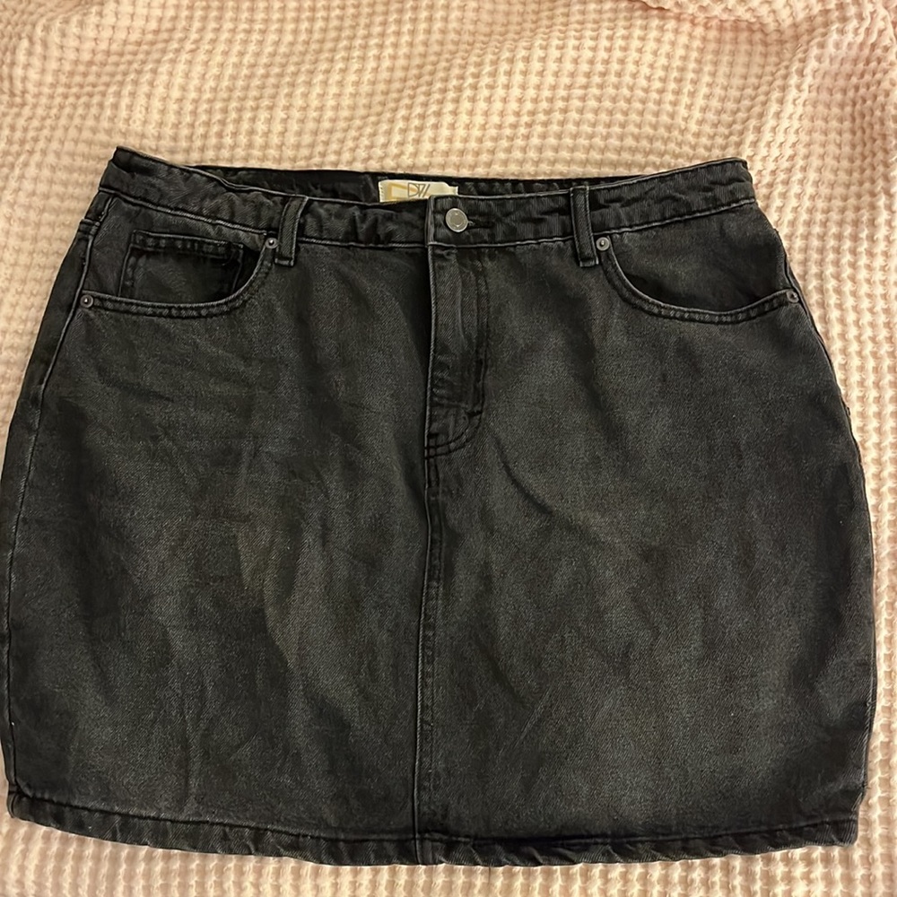 Gray denim skirt. Never worn. Size 14.